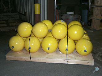 Plastic floats packaged with optional yellow paint Plastic floats packaged with optional yellow paint